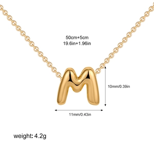 Golden bubble letter M pendant necklace with polished finish and adjustable chain