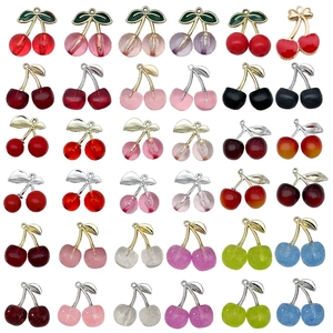 Colorful resin cherry pendants for DIY jewelry making in various finishes and colors