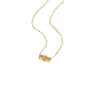 Gold cylinder pendant necklace with evil eye patterns on a minimalist gold chain