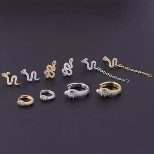 Snake earrings set in gold and silver finish with green zircon eyes in various styles