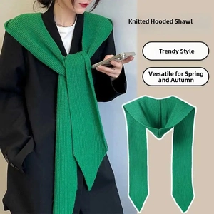 Detailed knit texture and hooded design of the green knitted shawl scarf wrap