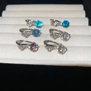 Bagues croisées en argent avec de grands cristaux colorés et des micro-diamants