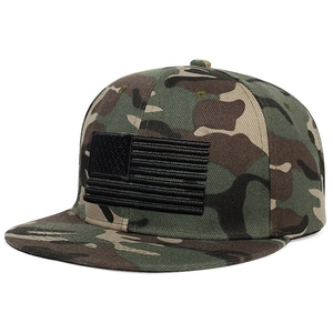 Close-up of high-quality US flag embroidery on jungle camouflage flat brim baseball cap