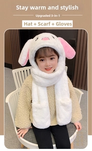 Three-in-one plush rabbit hat with scarf and gloves featuring moving ears for children