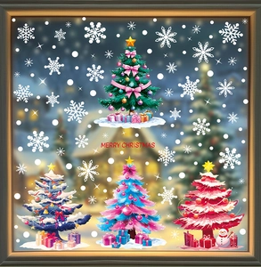 Detail view of colorful Christmas tree window stickers with snowflakes and gift box motifs