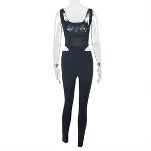 Close-up of black athletic jumpsuit featuring hollow-out waist design on a mannequin