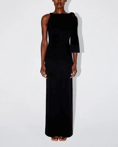 Detail of elegant black one-shoulder dress with decorative shoulder pleats and slim fit