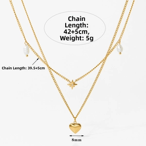 Detail view of double-layered gold necklace with star pendant and pearl heart charms