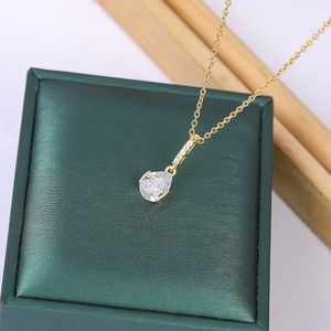 18K gold plated titanium necklace with teardrop zircon pendant on green leather box