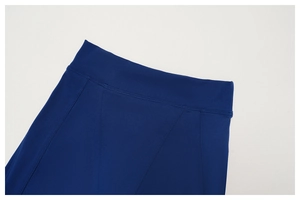 Detailed close-up of dark blue yoga leggings waistband with flatlock stitching