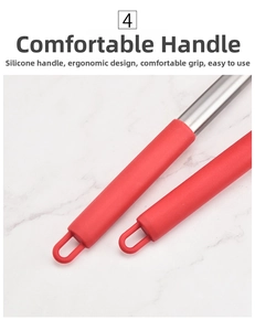 Close-up of red silicone ergonomic handles with stainless steel core and hanging loops