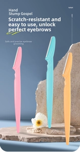 Detail of safety eyebrow razors with micro-guards on sharp blades and ergonomic handles