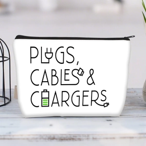 White canvas zipper pouch for plugs cables and chargers on a light wooden background