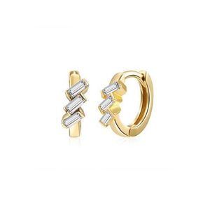 Macro detail of gold hoop earrings with three vertical baguette-cut clear zircon stones