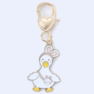 Cute white duck keychain with bunny ears and gold lobster clasp for backpack charms