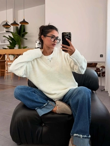 Women's American vintage cream V-neck knit sweater in a cozy oversized loose fit style