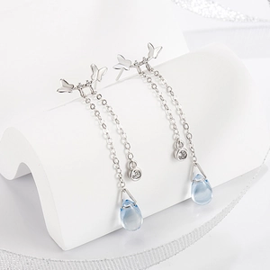 Elegant S999 silver butterfly earrings with moonstone accents and long chain pendants