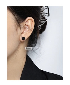 Minimalist S925 sterling silver ear studs with 8mm round black agate on model ear