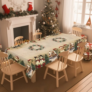 Detailed Christmas tablecloth with snowman and reindeer digital print on a wooden dining table