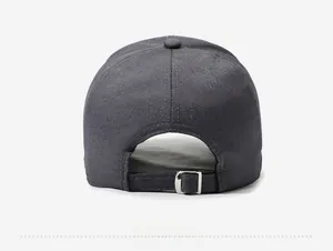Detail view of dark grey baseball cap showing back metal buckle and linen-like texture