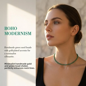 Detail of handmade emerald green bead necklace on model with bohemian style vibes