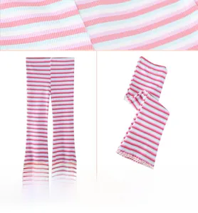 Detail of striped cotton ribbed knit leggings for girls with ruffled hem and macro texture