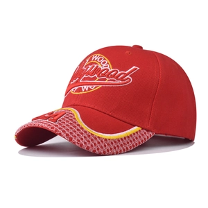 Detail of red Hollywood embroidery and LA logo on cotton twill baseball cap brim