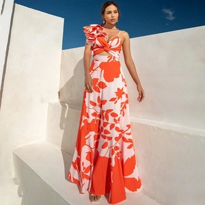 Floral print two-piece vacation set with ruffled one-shoulder top and maxi skirt