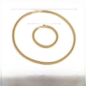 Detailed view of 6.5mm gold Cuban chain set with specific necklace and bracelet dimensions