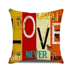 Detail of vintage industrial style cushion cover with Great Love Will Never Fade print