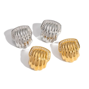 Luxe shell-shaped textured stud earrings in gold and silver finish with zircon accents