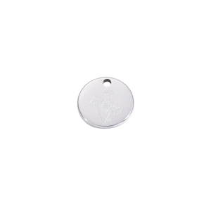 Detailed close-up of a silver stainless steel pendant with engraved daisy flower design