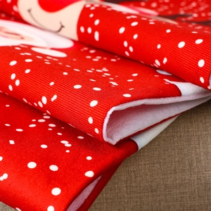 Detail of red striped fabric and soft white plush lining for Christmas chair covers