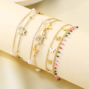 Double-layered 18K gold plated butterfly shell anklet with pearls and crystal details