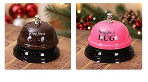 Pink and brown service bells with Ring for a HUG and Ring for a Coffee slogans