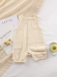 Sleeveless ribbed cotton baby romper in beige featuring front buttons and small pockets