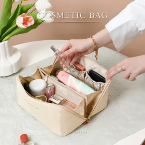 Large capacity cream white cosmetic bag with pillow design and multi-compartment storage