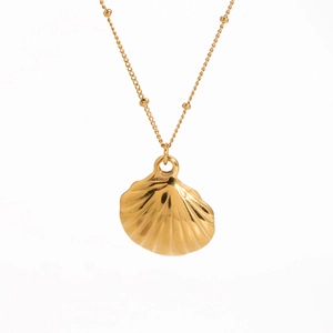 Detailed view of the gold seashell pendant on a high-quality titanium steel necklace