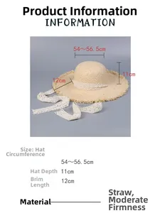 Detailed view of handmade woven straw hat featuring size dimensions and soft lace ribbon