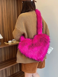 Fuchsia heart-shaped faux fur shoulder bag with long hair texture for women winter style
