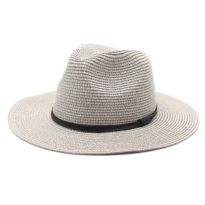 Detailed close-up of fine woven straw texture and slim black decorative band on fedora hat