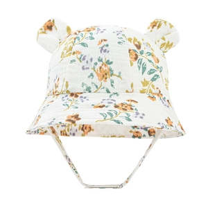 Detail of baby cotton bucket hat featuring floral print and cute 3D bunny ears