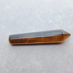 Polished natural tiger's eye hexagonal crystal point with golden fibrous texture
