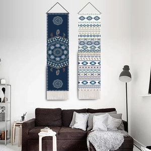 Detail showing two bohemian wall tapestries with dreamcatcher and tribal patterns