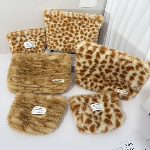 Faux fur leopard and brown cosmetic bag set in various sizes for travel storage