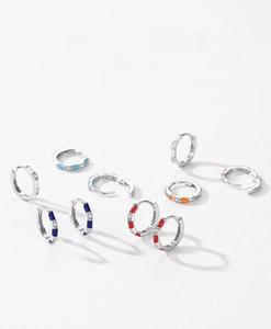 Macro shot of S925 sterling silver colorful enamel hoop earrings with micro-set zircons