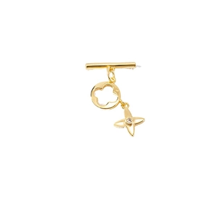 Golden T-bar necklace closure featuring a clover charm and a star pendant with zircon