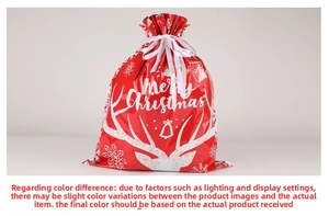 Close-up of red drawstring Christmas gift bag with festive reindeer and snowflake prints