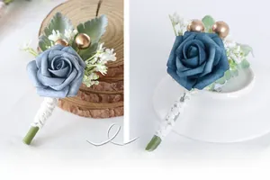 Detailed view of handmade velvet rose boutonniere with lace-wrapped stem and gold beads