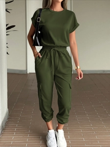 Detail view of olive green casual two-piece set featuring cargo pants with drawstring waist